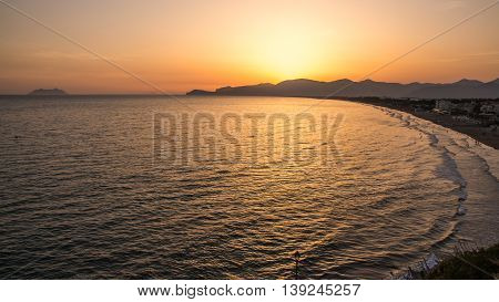 sunset on the beach of Sperlonga with the Circeo promontory in the background Italy