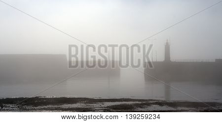 Anstruther Harbour  in Fife, Scotland as the mist rises on a warm autumn day 2015.