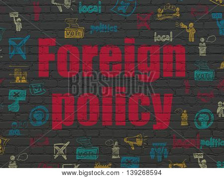 Political concept: Painted red text Foreign Policy on Black Brick wall background with  Hand Drawn Politics Icons
