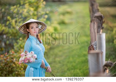 Asian Office Woman, Ao Dai Is Famous Traditional Costume For Woman In Vietnam