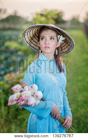 Asian Office Woman, Ao Dai Is Famous Traditional Costume For Woman In Vietnam