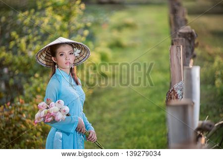 Asian Office Woman, Ao Dai Is Famous Traditional Costume For Woman In Vietnam