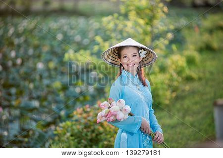Asian Office Woman, Ao Dai Is Famous Traditional Costume For Woman In Vietnam