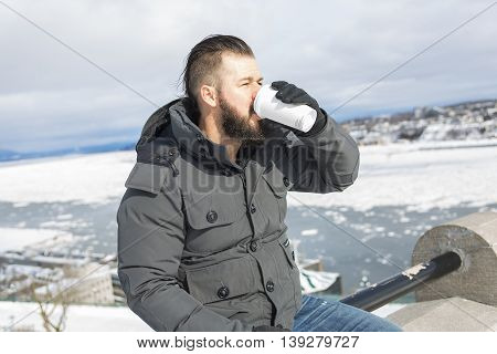 A Gorgeous young man looking outdoors in winter season