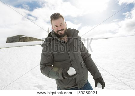 A Gorgeous young man looking outdoors in winter season
