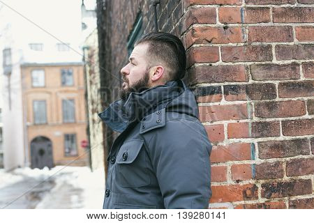 A Gorgeous young man looking outdoors in winter season