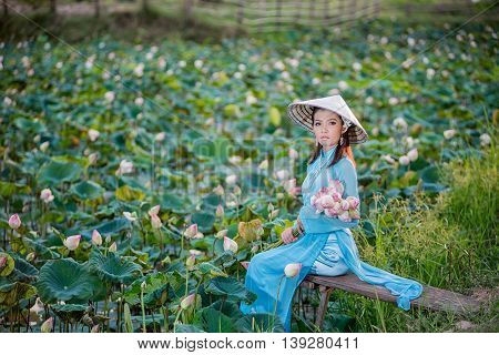 Asian Office Woman, Ao Dai Is Famous Traditional Costume For Woman In Vietnam