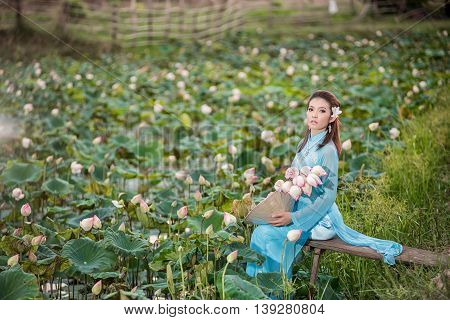 Asian Office Woman, Ao Dai Is Famous Traditional Costume For Woman In Vietnam