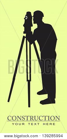 theodolit. construction worker with the theodolit tools