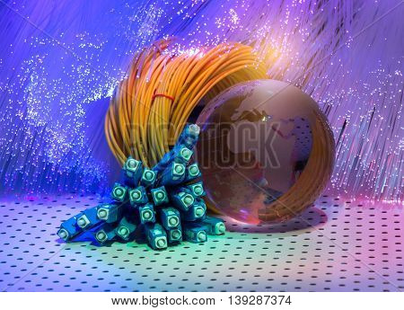 earth globe against fiber optic background