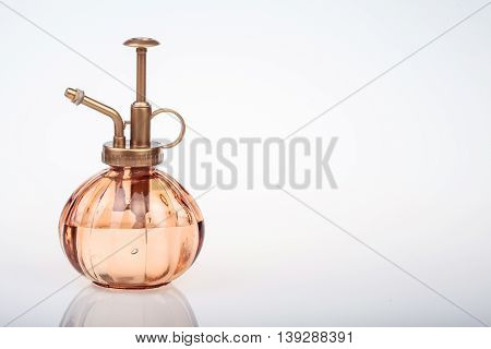 Vintage Perfume Bottle With Atomizer Isolated On White Background