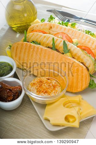 close up image of assorted panini sandwich