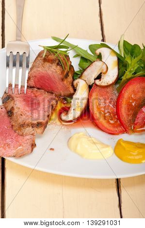 image of beef filet mignon grilled with vegetables