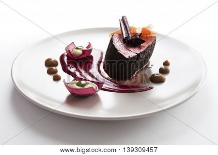 Delicious modern veal fillet served with sauce. Molecular cuisine with steak.