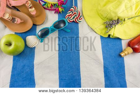 Summer Accessories On Beach Towel