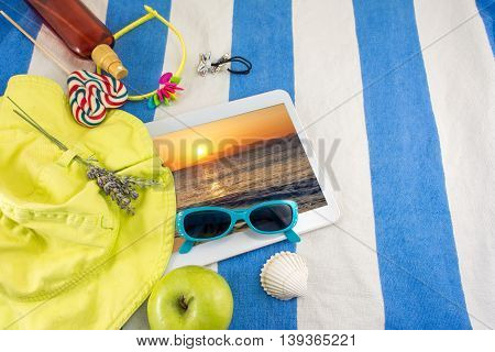 Summer Accessories On Beach Towel