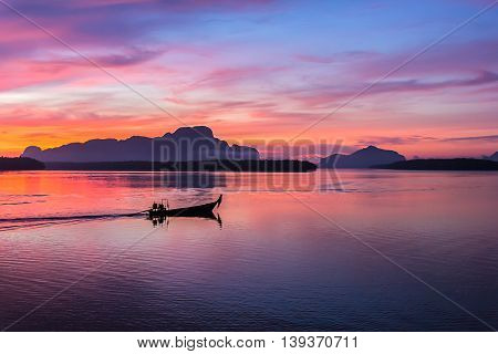 fisherman on local fishing boat at Samchong fishing village on sunrise in Phang-NgaThailand