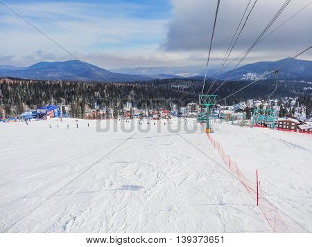 SHEREGESH RUSSIA - February 29 2016: The view from the main slopes in town hotel Sheregesh ski resort