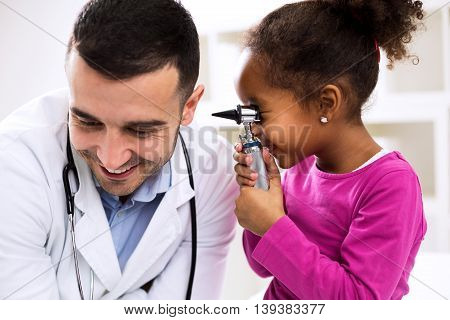 Doctor Otologist Palying With His Patient