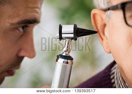 Doctor Performs An Ear Examination