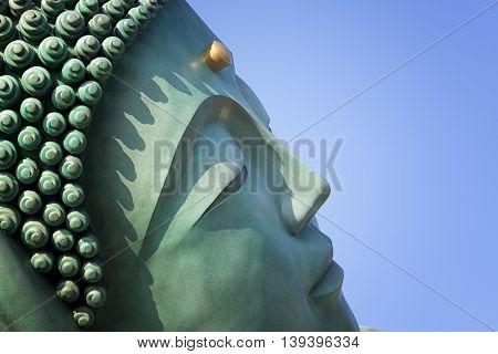 The bronze statue of reclining Buddha state at Nanzoin Temple in Sasaguri, Fukuoka, Japan.This is the bigest lying statue in the world.