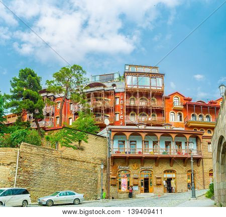 TBILISI GEORGIA - MAY 28 2016: The hilly neighborhood of Metekhi Church is popular among the tourists here located family hotels nice cafes and wine boutiques on May 28 in Tbilisi.