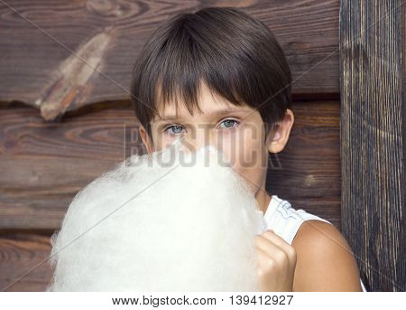 kids eating cotton candy sugar sweet tasty