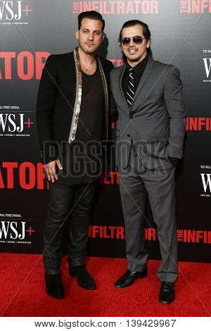 NEW YORK-JULY 11: Director Brad Furman (L) and actor John Luguizamo attend 'The Infiltrator' New York premiere at AMC Loews Lincoln Square 13 Theater on July 11, 2016 in New York City.