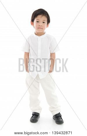 Happy little asian boy in white cothes on white background isolated