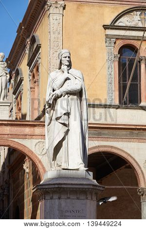 Verona Italy - Febuary 20 2016: Monument to Dante in Piazza dei Signori which is a city square located in the historic center of Verona. Dante was a major Italian poet of the late Middle Ages.