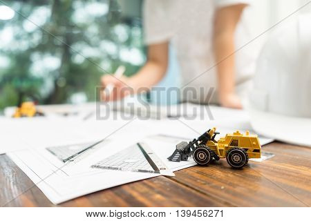architect desk on wooden table, architectural concept