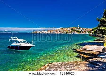 Kali beach and boat on turquoise sea Island of Ugljan Croatia