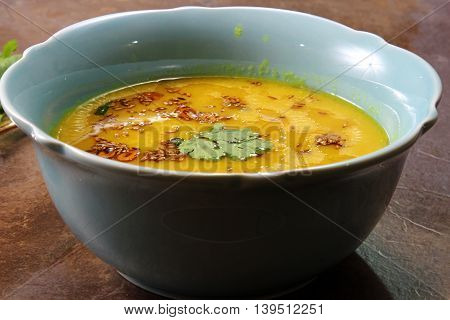 Yellow Lentil soup or Arhar Daal fry with the tadka of cumin seeds garlic and green chilies