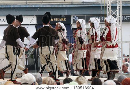ZAGREB, CROATIA - JULY 22: Members of folk group Etnos from Skopje, Macedonia during the 50th International Folklore Festival in center of Zagreb, Croatia on July 22, 2016