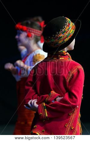 ROMANIA TIMISOARA - JULY 9 2016: Child Ukrainian dancers in traditional costume present at the international folk festival "International Festival of hearts" organized by the City Hall Timisoara.