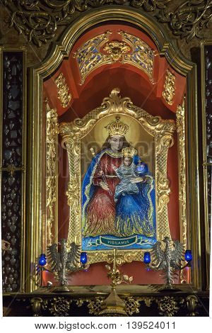 Paclawska Kalwaria Poland - July 18 2016: The image of Our Lady of Kalwaria in the altar of the shrine of Kalwaria Pacławska Poland