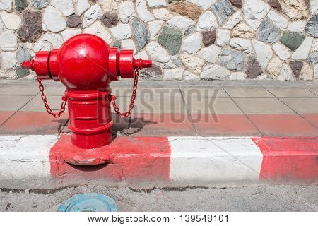 Asian Fire Hydrant On Street. Typical Red Fire Hydrant Asian On Street. Red Fire Hydrant Vintage Sty