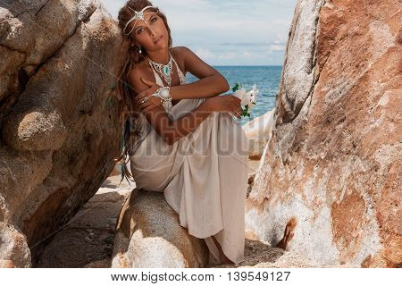 beautiful young woman in white dress outdoors portrait
