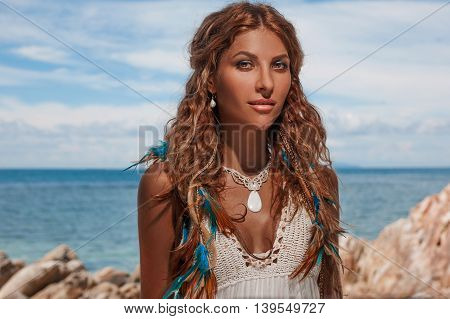 beautiful young woman in white dress outdoors portrait