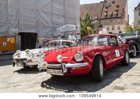 Nurnberg Bavaria / Germany - July 19th 2014: red Triumph GT6 displayed vintage car at Sud - Rallye- Historic event in Nurnberg