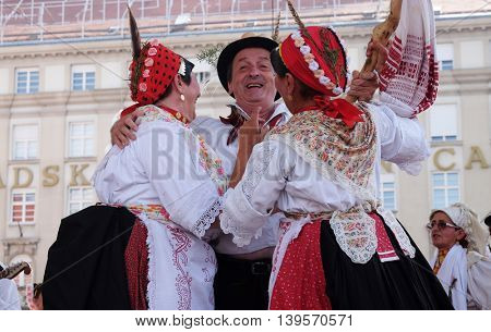 ZAGREB, CROATIA - JULY 23: Members of folk group Kolo from Donja Bebrina, Croatia  during the 50th International Folklore Festival in center of Zagreb, Croatia on July 23, 2016