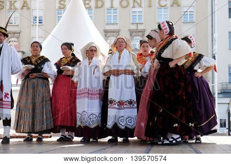 ZAGREB, CROATIA - JULY 23: Members of folk group Kolo from Donja Bebrina, Croatia  during the 50th International Folklore Festival in center of Zagreb, Croatia on July 23, 2016