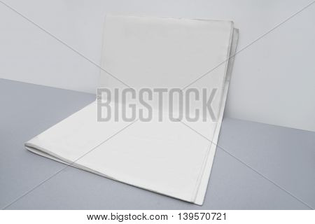 Blank newspaper cover template isolated on grey background with clipping path ready for your artwork