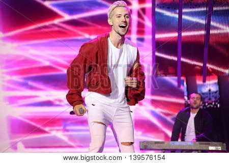 VITEBSK, BELARUS - JULY 17: Latvian pop singer Markus Riva performs during the 25th Slavyansky Bazar Festival on July 17, 2016 in Vitebsk, Belarus