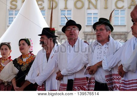 ZAGREB, CROATIA - JULY 23: Members of folk group Kolo from Donja Bebrina, Croatia  during the 50th International Folklore Festival in center of Zagreb, Croatia on July 23, 2016