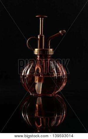 vintage perfume bottle with a dark background