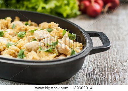 Pilaf Rice-curry With Chicken And Salad In The Form Of Iron