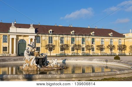 Fountain in Schonbrunn palace courtyard, Vienna, Austria
