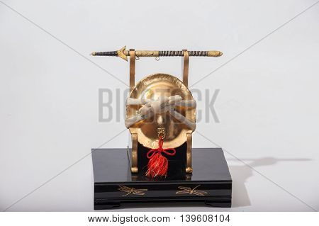 Kabuto helmet display with samurai katana sword.