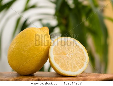 Ripe two lemons on a summer background